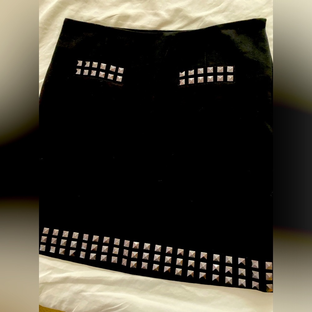 INC International Concepts black skirt with grey grommets. Size 8.
